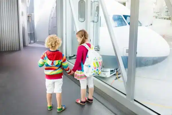 two kids in airport
