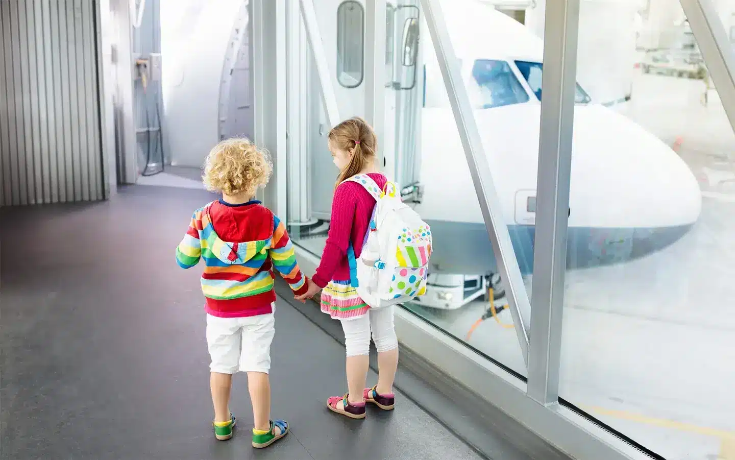 two kids in airport